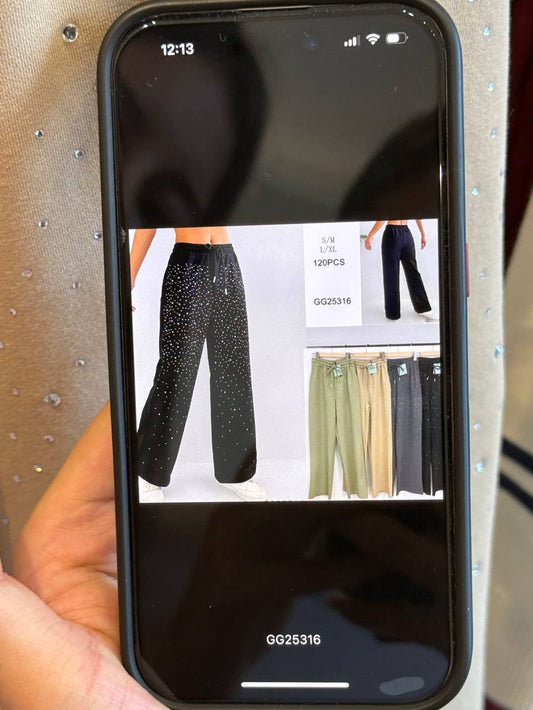 Trousers with hot-fix rhinestones