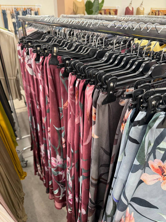 Knitted vest paired with a cardigan .