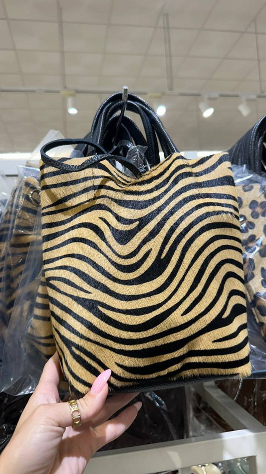 The bag is made of a natural pony