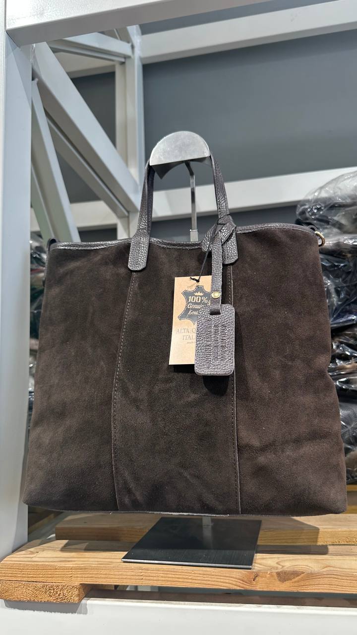 A medium-sized suede bag.