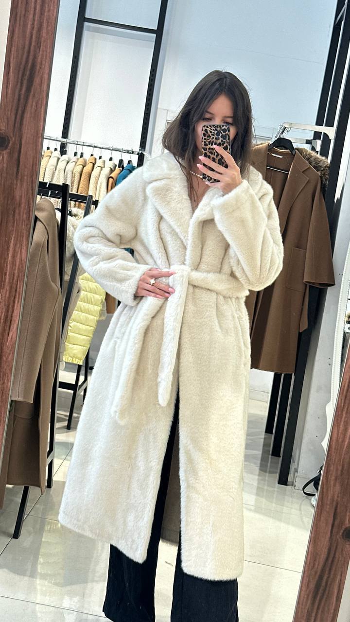 Midi-length fur coat.