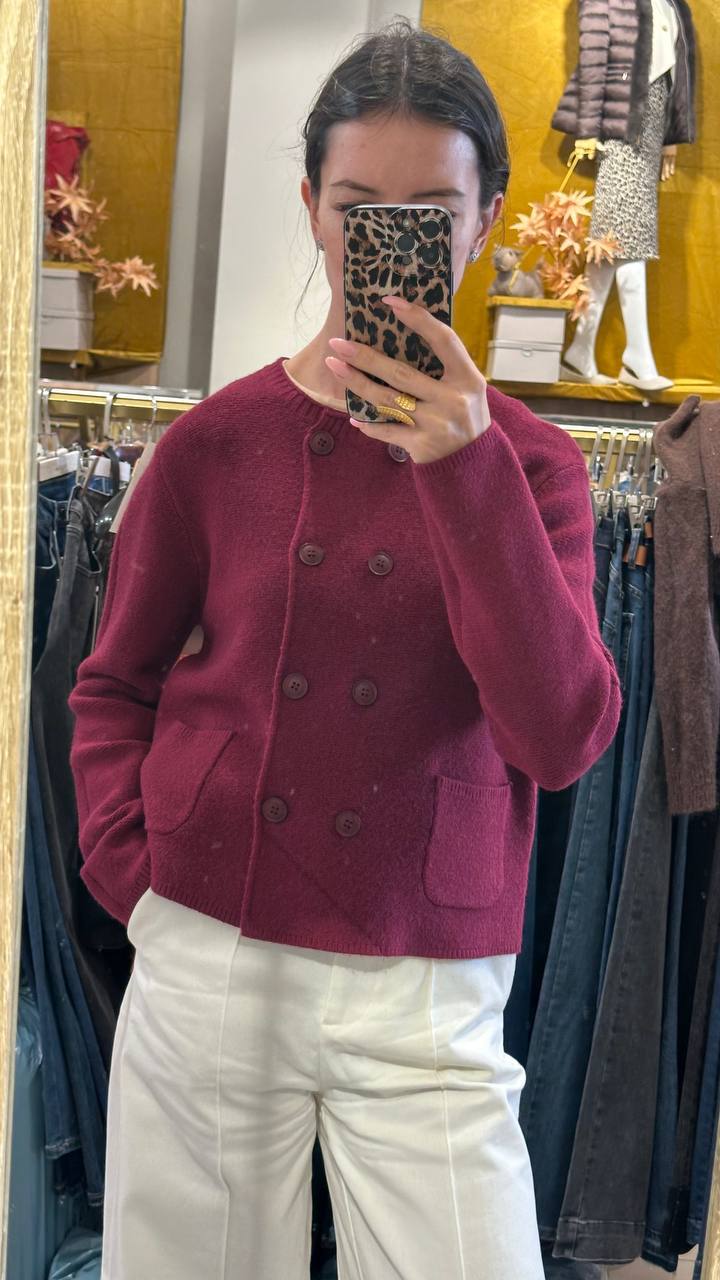 Knitted double-breasted Chanel-style jacket.