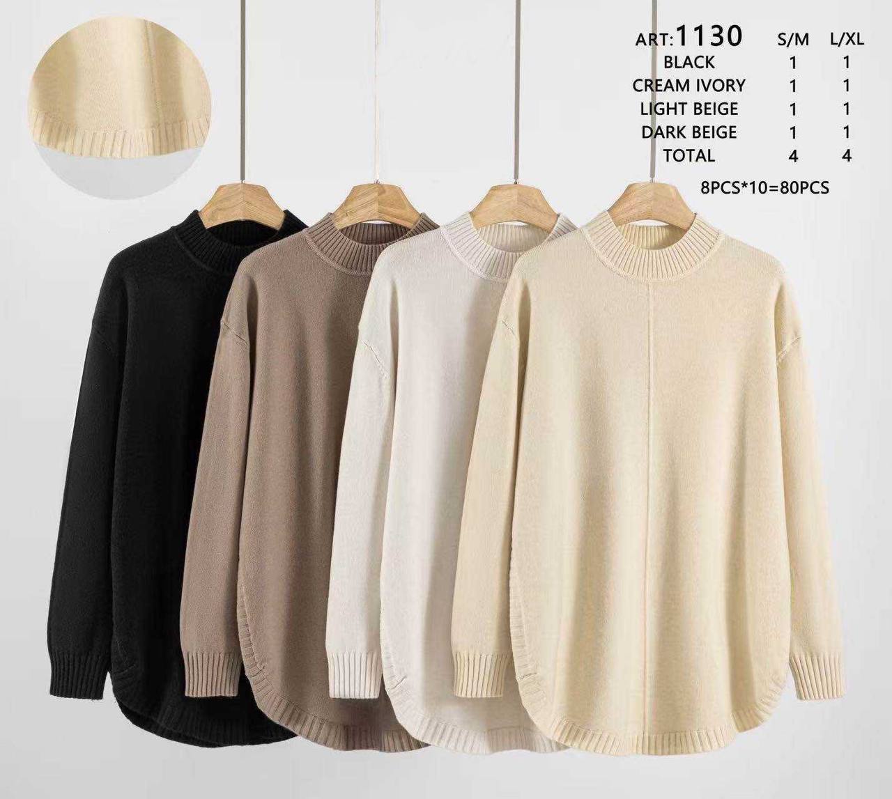 An extended loose-fit knitted jumper