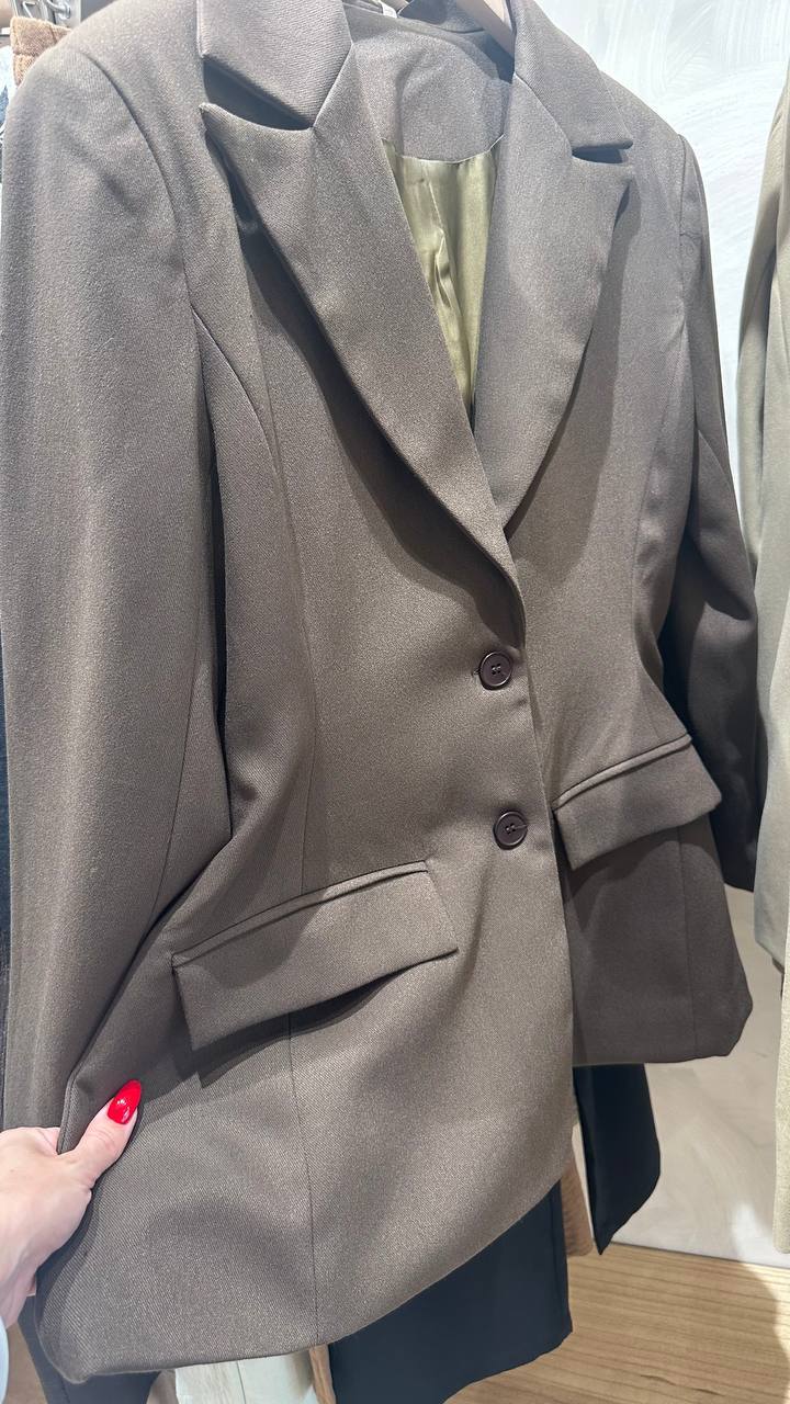 A chic chocolate-colored fitted blazer