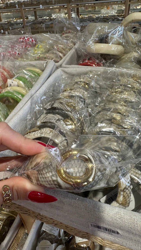 Plastic bracelet with imitation coin