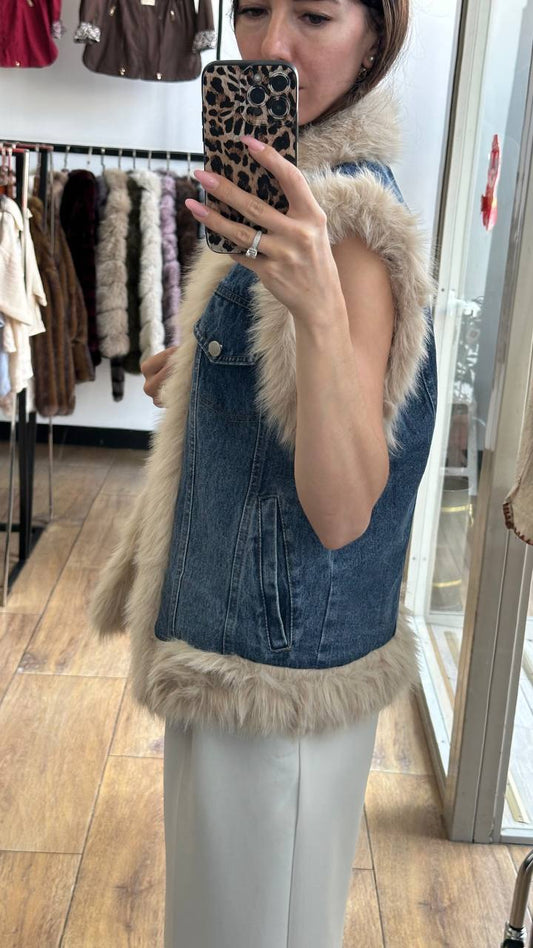 A medium-length denim vest