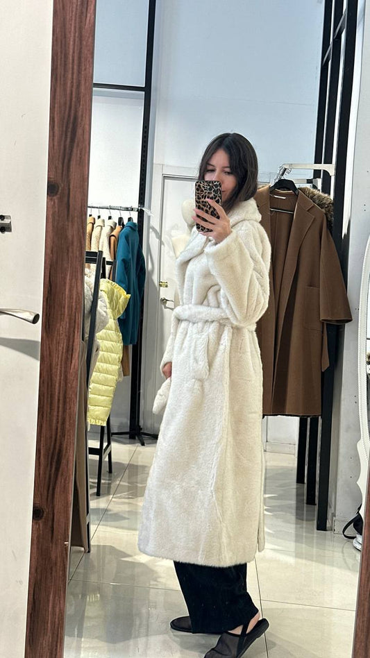 Midi-length fur coat.