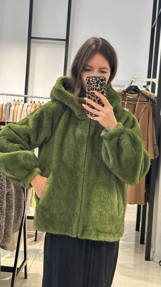 Fur coat in apple color.
