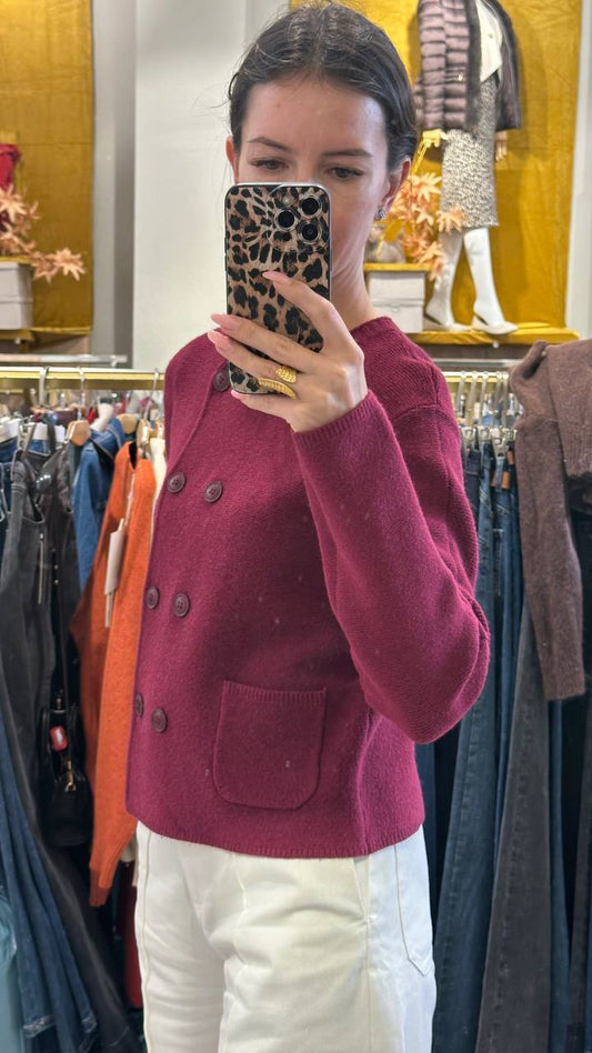 Knitted double-breasted Chanel-style jacket.