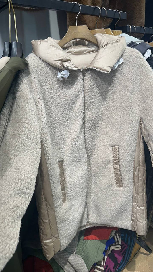 A quilted reversible half-coat