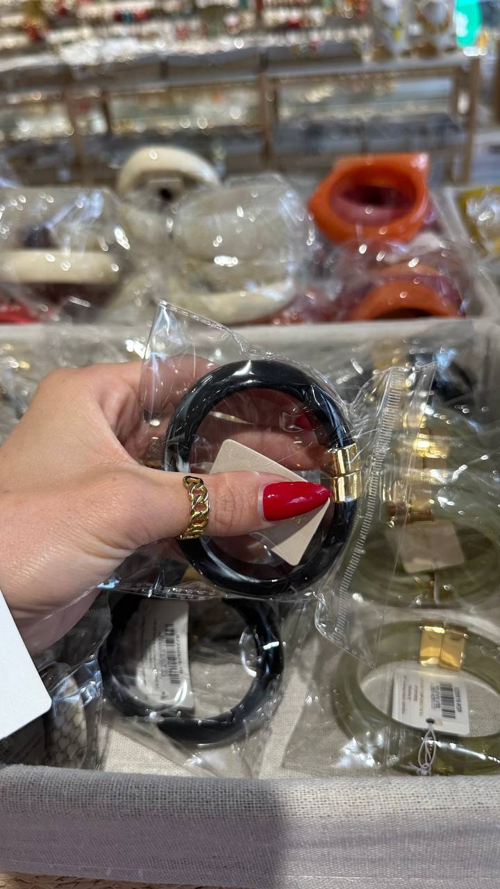 Plastic bracelet with imitation coin