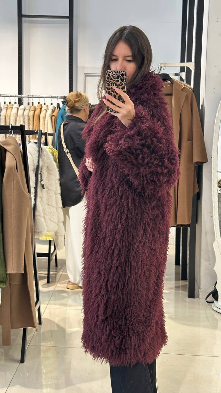 Striking llama coat in wine color.