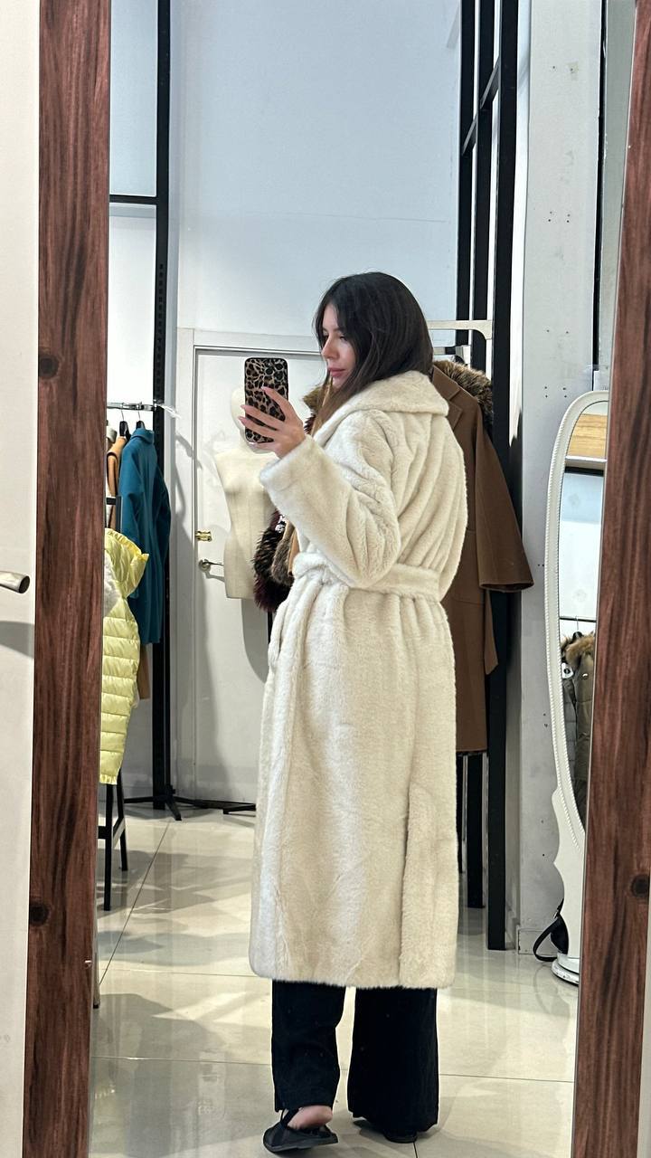 Midi-length fur coat.