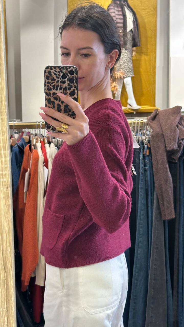 Knitted double-breasted Chanel-style jacket.