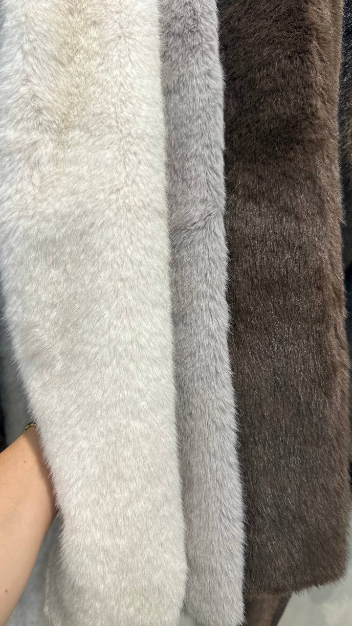 Midi-length fur coat.