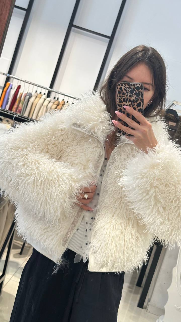 Bomber-style fur coat in cream color