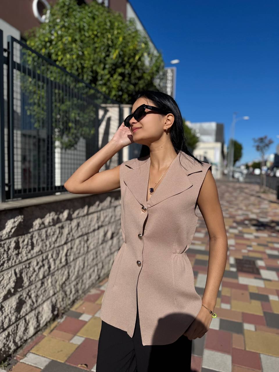 A knitted long vest