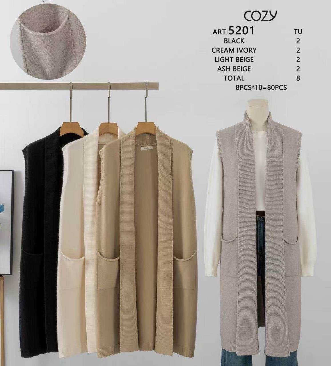 An elongated knitted vest