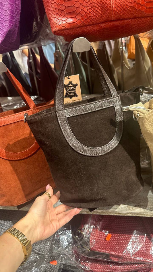 The bag is made of natural suede