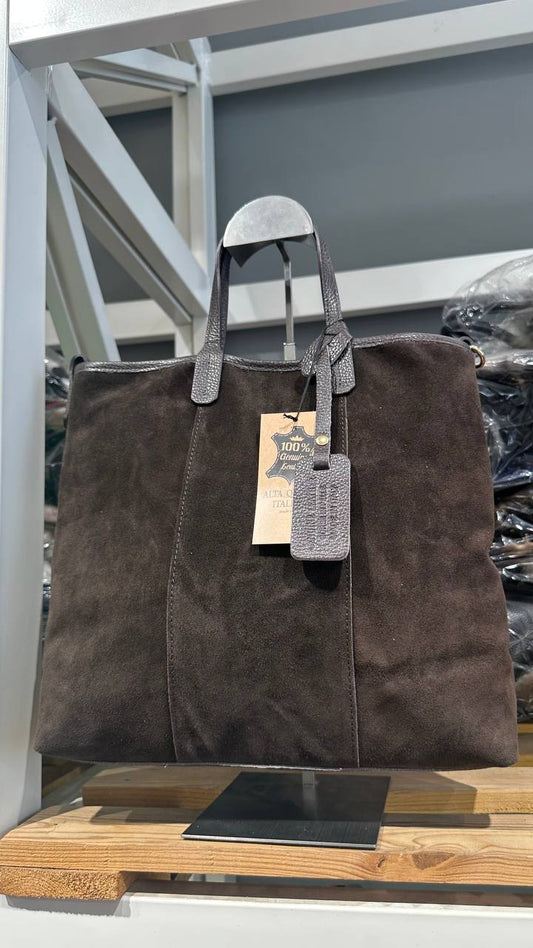 A medium-sized suede bag.