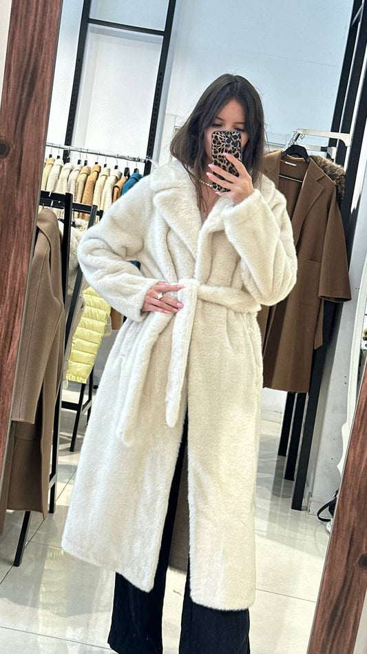 Midi-length fur coat.