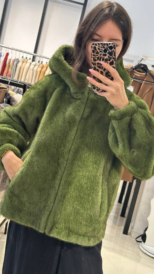 Fur coat in apple color.