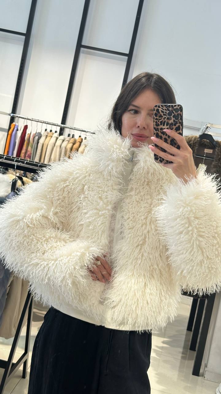Bomber-style fur coat in cream color