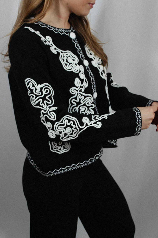 A cardigan with textured embroidery