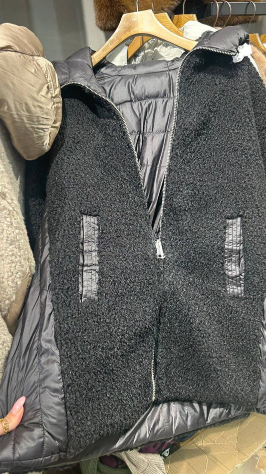 A quilted reversible half-coat