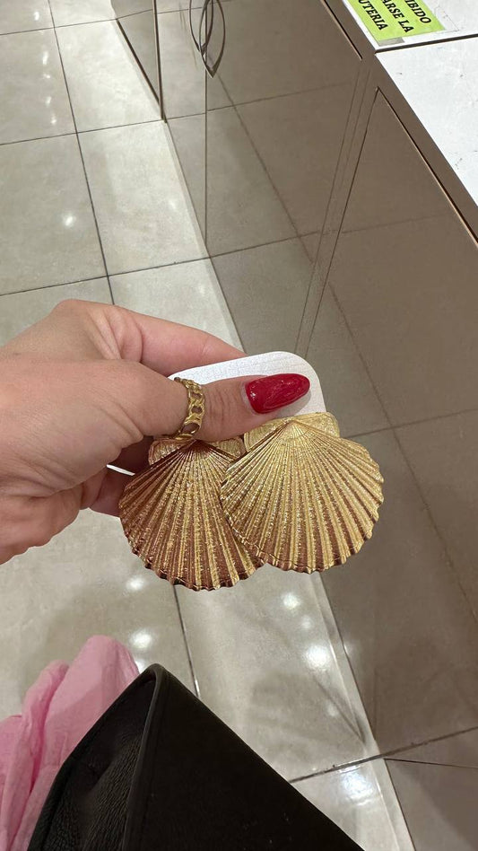 Earrings in the shape of seashells.