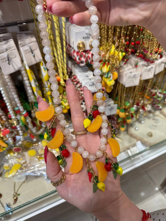 A necklace with tangerines