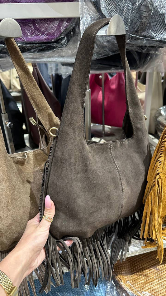 A Spanish-themed suede model