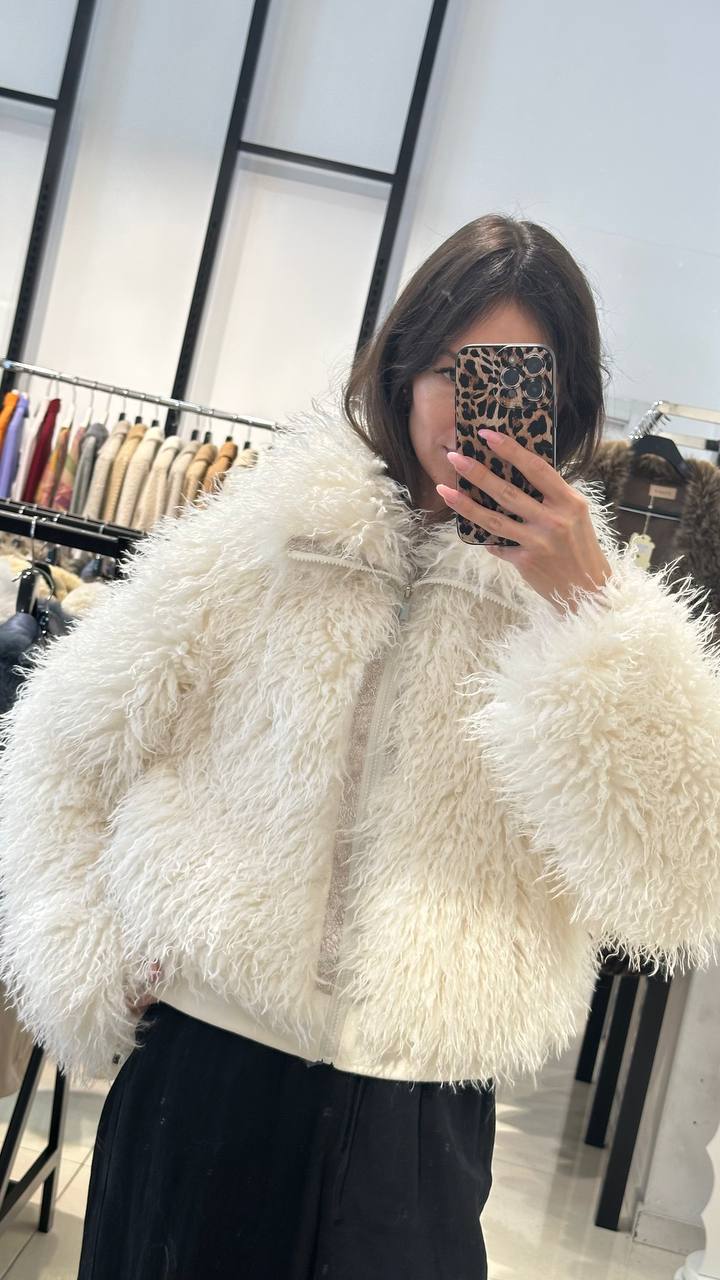 Bomber-style fur coat in cream color
