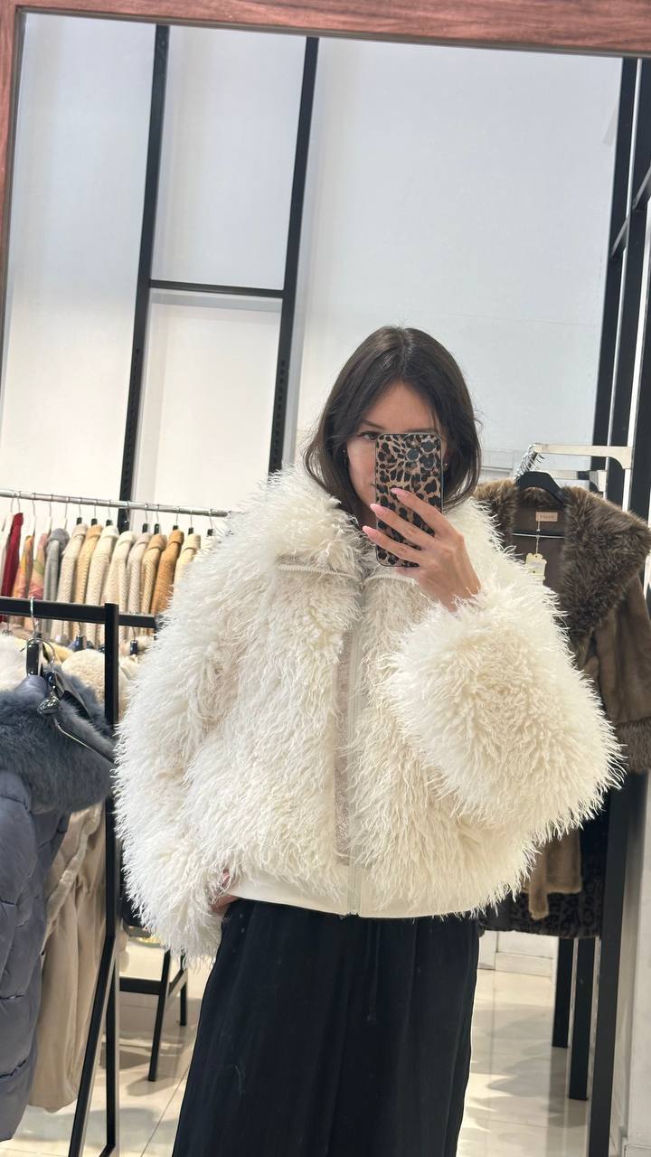 Bomber-style fur coat in cream color