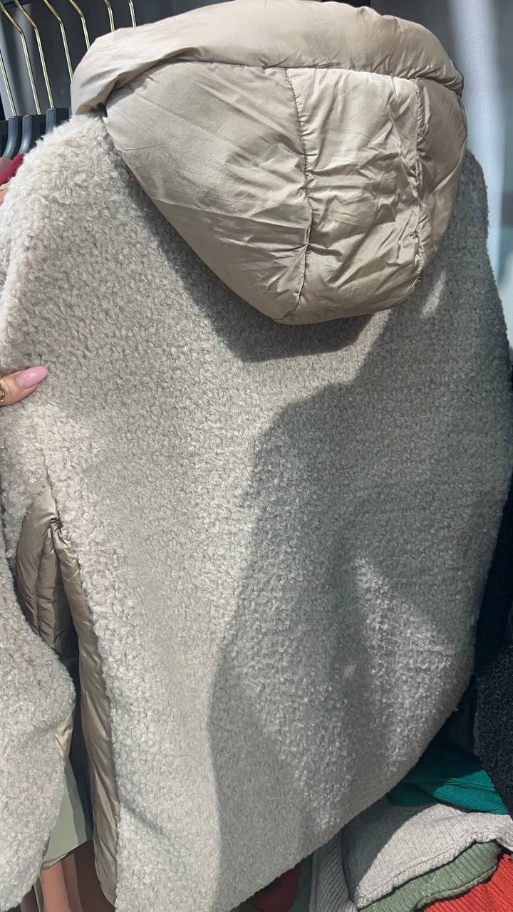 A quilted reversible half-coat