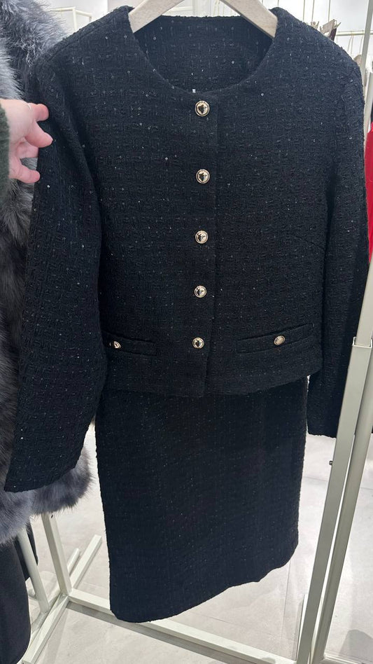 Tweed Chanel-style suit